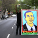 A Black Lives Matter protester holds up an illustration of Stephon Clark during a march and demonstration through the streets of Sacramento, Calif., on April 4, 2018.